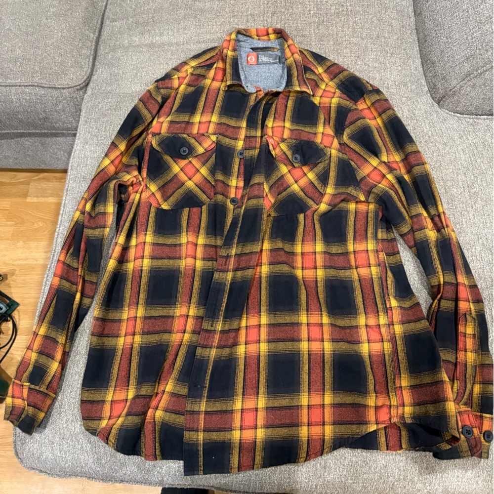The American Outdoorsman orange and brown and Plaid long sleeve t shirt.